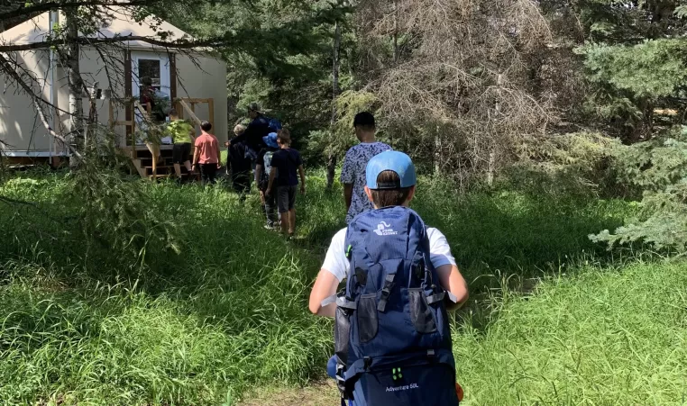 Max entering his Yurt with his group on the first day of Camp