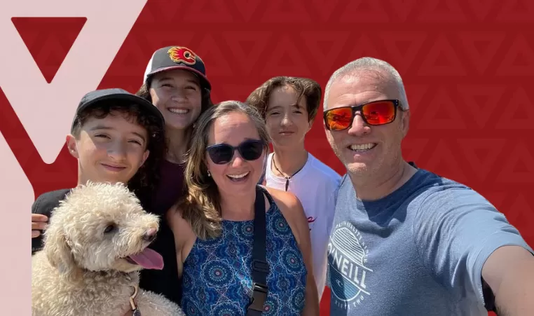 Terry Barron smiles with his family